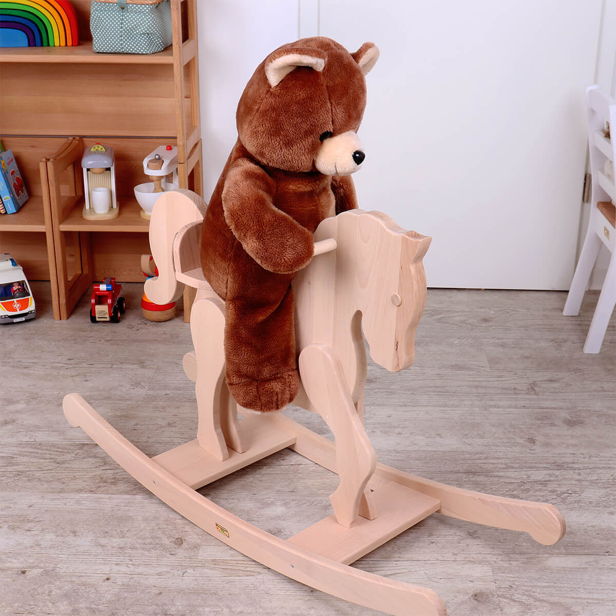 Schaukelpferd mit Teddy