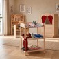 Preview: Puppen Wickeltisch aus Naturholz harmonisch in ein helles skandinavisches Kinderzimmer integriert