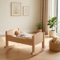 Preview: Puppenwiege mit Wiegenkufen harmonisch integriert in ein skandinavisches Kinderzimmer.