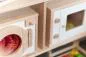 Preview: waschmaschine und mikrowelle eingebaut in spielständer, detailaufnahme Preview: waschmaschine und mikrowelle eingebaut in spielständer, detailaufnahme