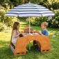 Preview: Holz Kinder Wippe als Tisch im Garten mit Sonnenschirm und Picknick