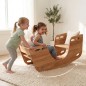 Preview: Zwei Kinder wippen gemeinsam auf der Holz Schiffschaukel im hellen Kinderzimmer