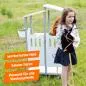 Preview: Kind lacht und spielt mit Steckenpferd vor einem Steckenpferd-Stall Schrank