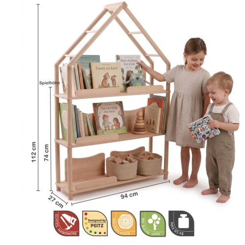 Montessori Bücherregal BERGEN harmonisch integriert in ein helles skandinavisches Kinderzimmer.