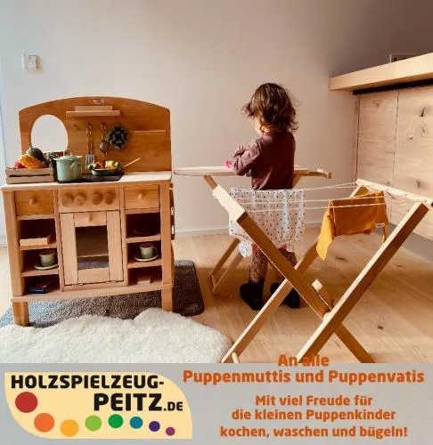 Kinderzimmer-Waeschetrockner-Waeschespinne-Wäscheleine-Mädchchen-Kinderzimmer-Wäsche-Küche