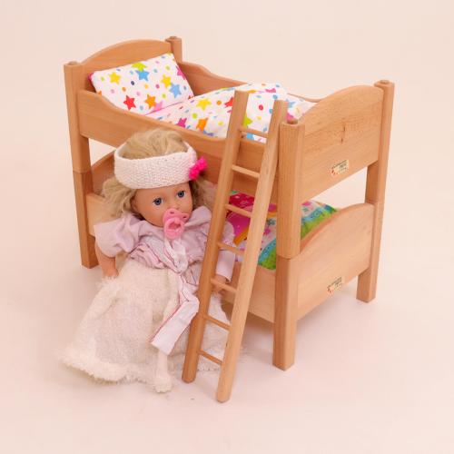 Puppenbett mit Bettwäsche