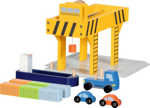 Gelber Holz-Hafenkran mit Magnetfunktion verlädt Container auf LKW