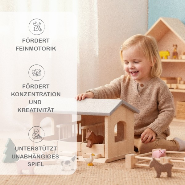 Kind spielt mit dem Pferdestall Lisa von Holzspielzeug Peitz