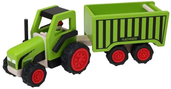 Ladewagen an grünem Spielzeugtraktor angehangen.