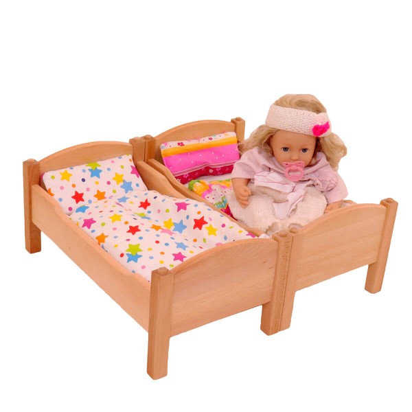 Puppenbett mit Bettwäsche