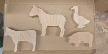Tierrohlinge 4er-Set mit zwei Pferden, Gans und Schwein aus Holz